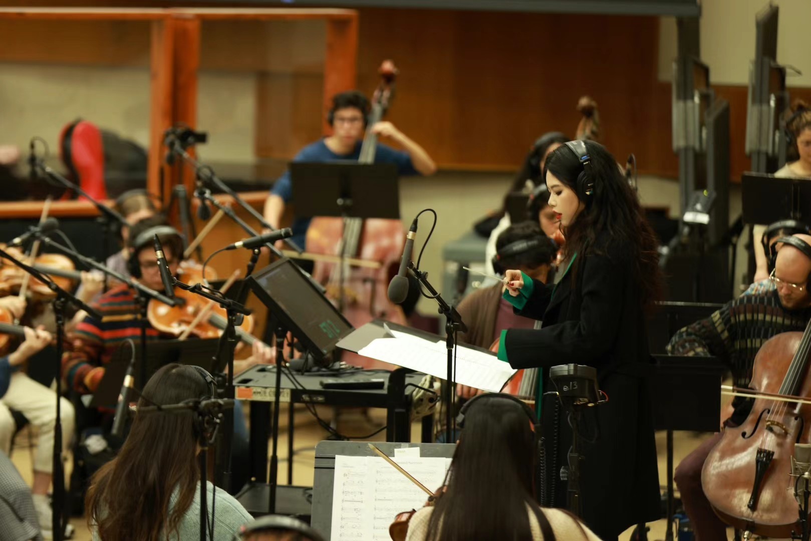 Junwen Wu in an orchestral recording session